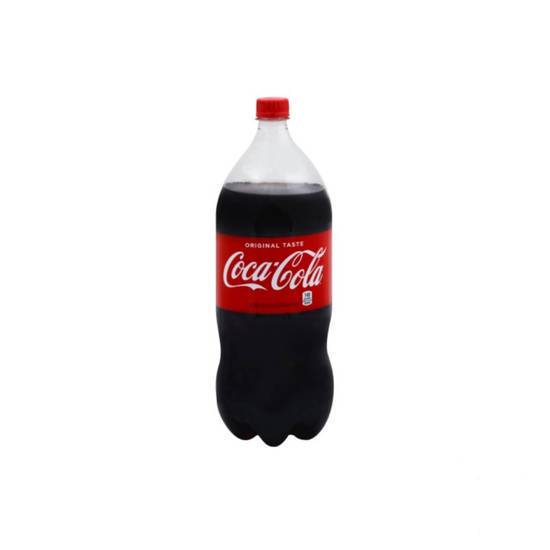 Order Coke 2L food online from Pink Dot store, Palm Springs on bringmethat.com