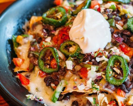 Order Santa Fe Nachos food online from La Palmera store, seattle on bringmethat.com