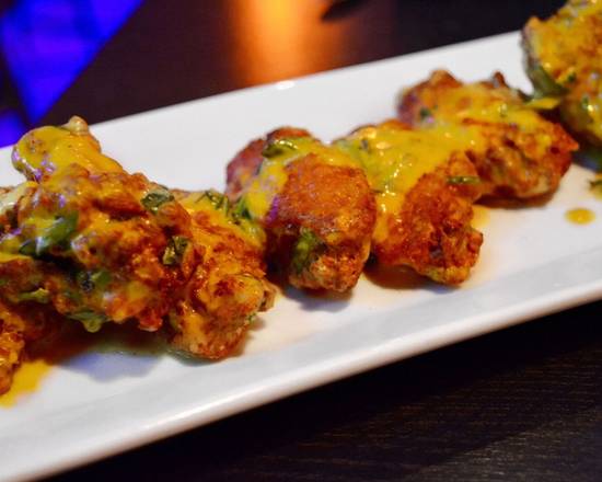 Order Phuket Wing (6pcs) food online from Emporium Thai Cuisine store, Los Angeles on bringmethat.com