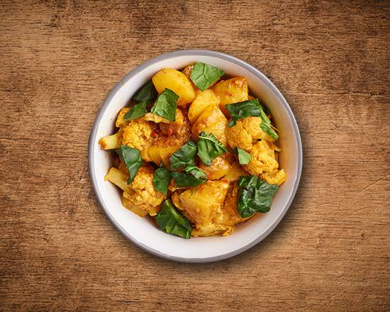 Order Divine Potato cauliflower  food online from United Kitchens Of India store, Schaumburg on bringmethat.com