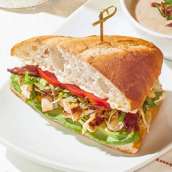 Order CHICKEN CALIFORNIA CLUB SANDWICH food online from California Pizza Kitchen store, Honolulu on bringmethat.com