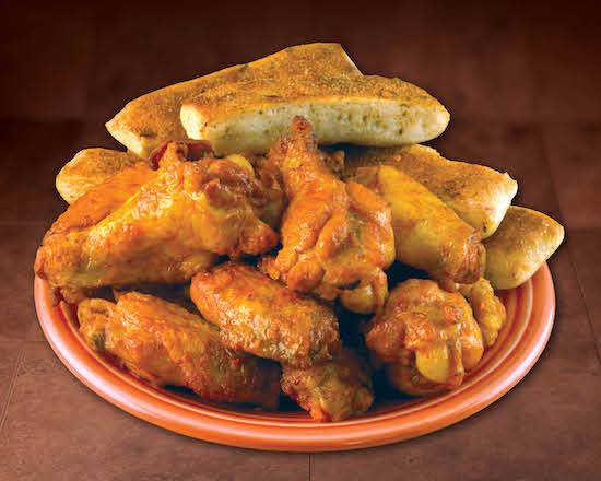 Order Eight Wings Bone in food online from Hungry Howie's Pizza store, Tallahassee on bringmethat.com