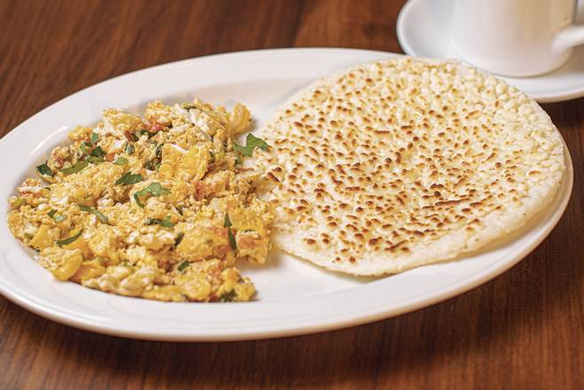 Order Scrambled eggs with Tomatoes and Onions food online from Sabor a Colombia Restaurant & Bar store, Levittown on bringmethat.com