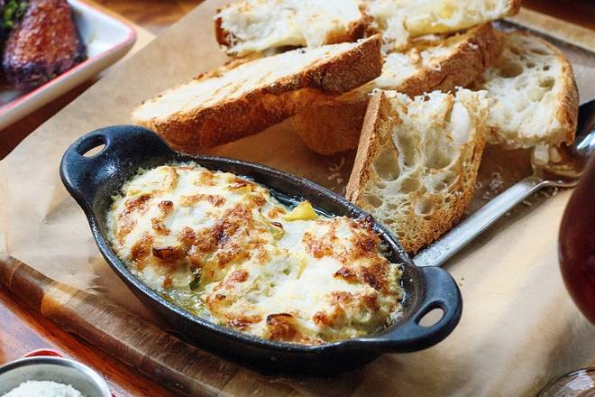 Order Hot Crab & Artichoke Dip food online from Founding Farmers Tysons store, Providence on bringmethat.com