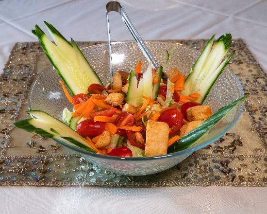 Order Cucumber Salad food online from India Palace store, Bonita Springs on bringmethat.com