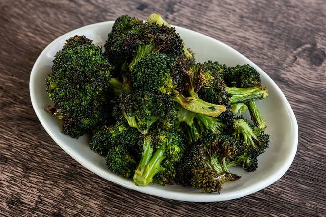 Order Roasted Broccoli food online from Wood Ranch BBQ & Grill store, Moorpark on bringmethat.com