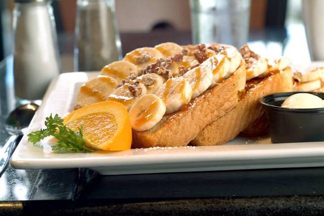 Order Banana, Nut and Caramel French Toast food online from Keke's Breakfast Cafe store, Oviedo on bringmethat.com