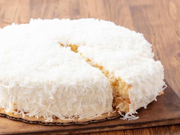 Order Coconut Cream Cake food online from La Madeleine store, Cleburne on bringmethat.com