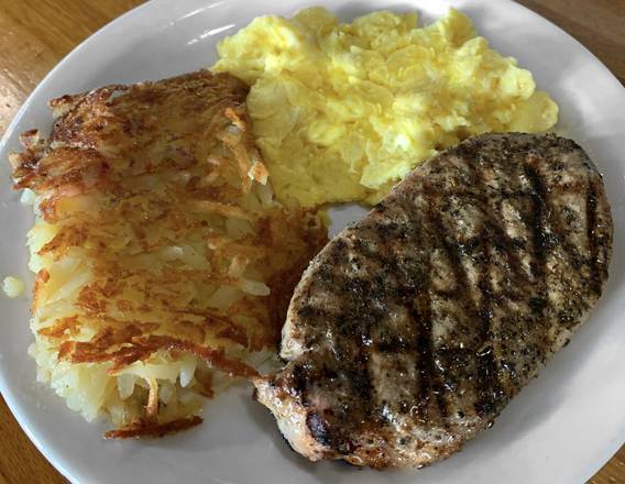 Order Chargrilled Pork Chop food online from Zachary's Restaurant store, Cape Canaveral on bringmethat.com