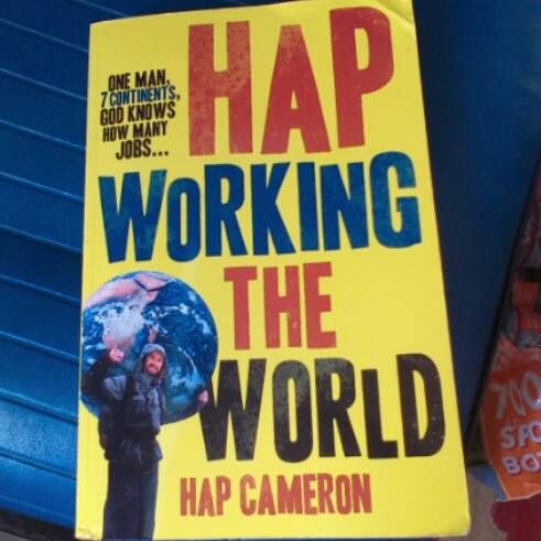 Order Hap Working The World Book (Paperback)  food online from Happy Cones Co store, EDGEWATER on bringmethat.com