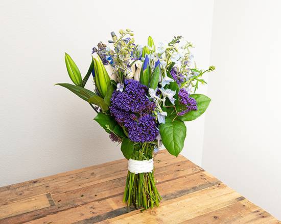 Order White, Blue, Purple Wrapped Bouquet food online from @flowers Brier Creek store, Raleigh on bringmethat.com