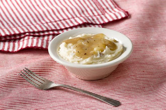 Order Mashed Potatoes with Brown Gravy food online from Cracker Barrel Old Country Store store, Somerset on bringmethat.com