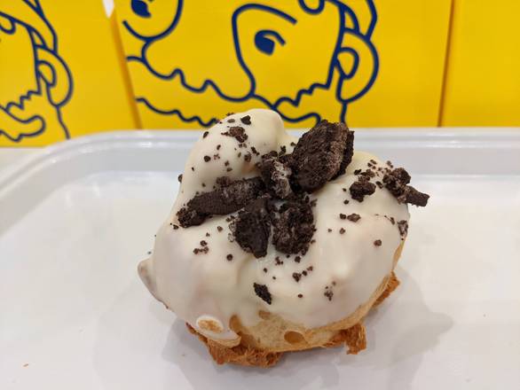 Order Cookies & Cream eclair shell food online from Beard Papa's store, Austin on bringmethat.com