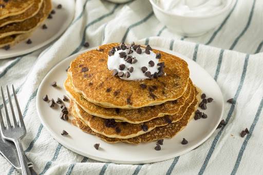 Order Chocolate Chip Pancakes (5 Stack) food online from The Royal Breakfast store, Fort Myers on bringmethat.com