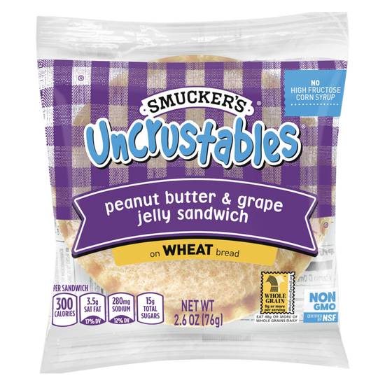 Order Smucker's Frozen Uncrustables PB & Grape Jelly on Wheat 1ct 2.6oz food online from Everyday Needs by Gopuff store, Baton Rouge on bringmethat.com