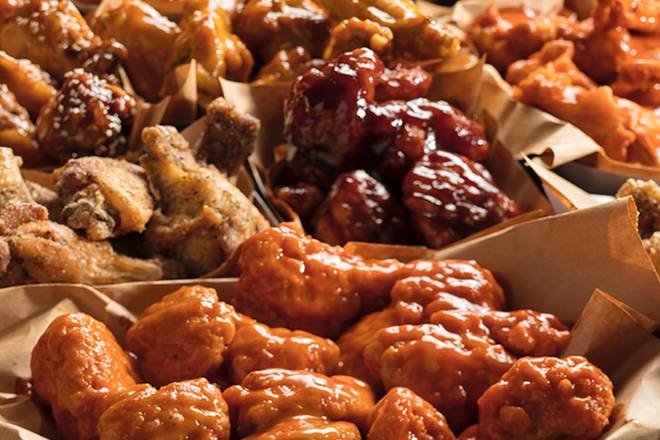 Order 50 PC BONELESS WINGS food online from Charleys Cheesesteaks And Wings store, Orlando on bringmethat.com