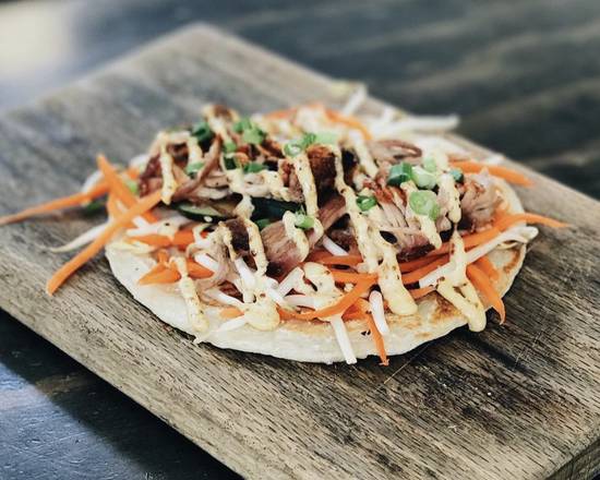 Order Lemongrass Pork Roti (2) food online from EM Trai Sandwich Co store, Metairie on bringmethat.com