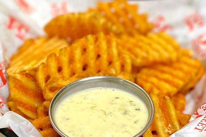 Order SEASONED WAFFLE FRIES WITH GRINGO DIP food online from 54th Street Restaurant & Drafthouse store, Live Oak on bringmethat.com