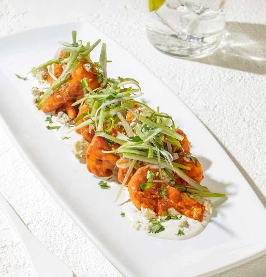 Order SPICY BUFFALO CAULIFLOWER food online from California Pizza Kitchen store, Orlando on bringmethat.com