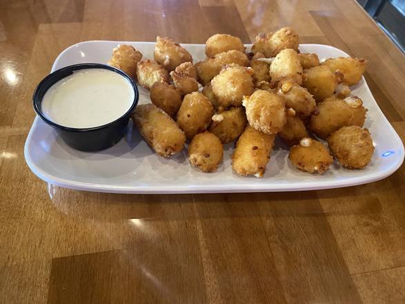 Order Cheese Curds food online from Tradition's Restaurant store, West Fargo on bringmethat.com