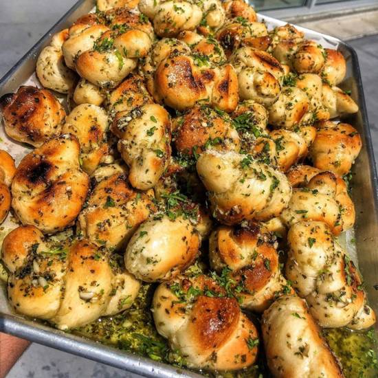 Order Dozen - Garlic Knots food online from Wall Street Pizza store, Culver City on bringmethat.com