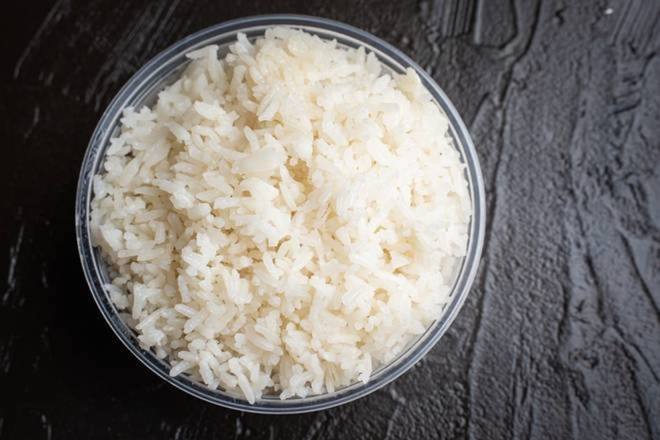 Order White Rice food online from El Pollo Rico store, Silver Spring on bringmethat.com