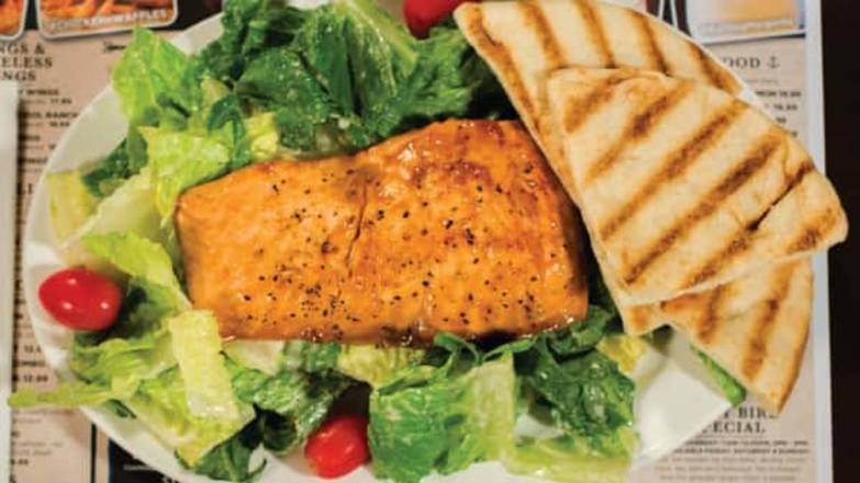 Order Caesar Salad w/Salmon food online from Dallas BBQ store, Jamaica on bringmethat.com