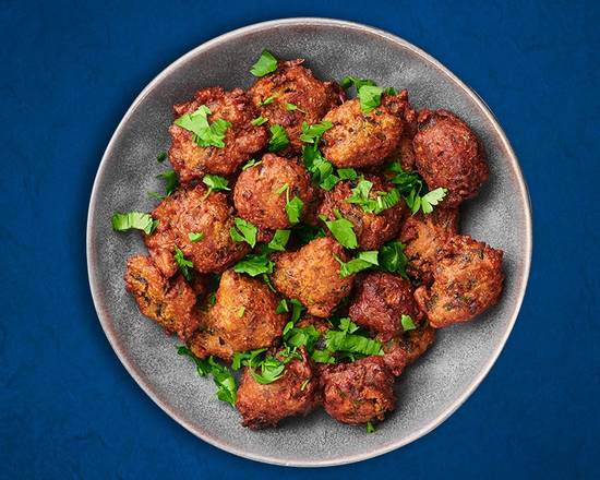 Order Golden Veggie Fritters (Vegan) food online from Indian Vegan Experiment store, Ocean on bringmethat.com