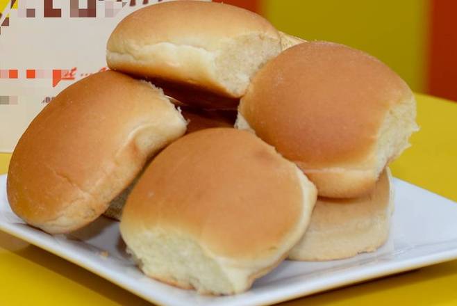 Order 12 Dinner Rolls food online from Chicken Delight store, Jersey City on bringmethat.com