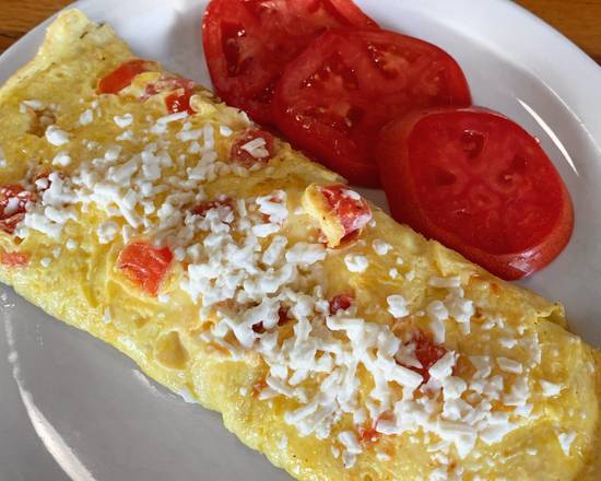 Order Feta & Tomato Omelet food online from Zachary's Restaurant store, Cape Canaveral on bringmethat.com