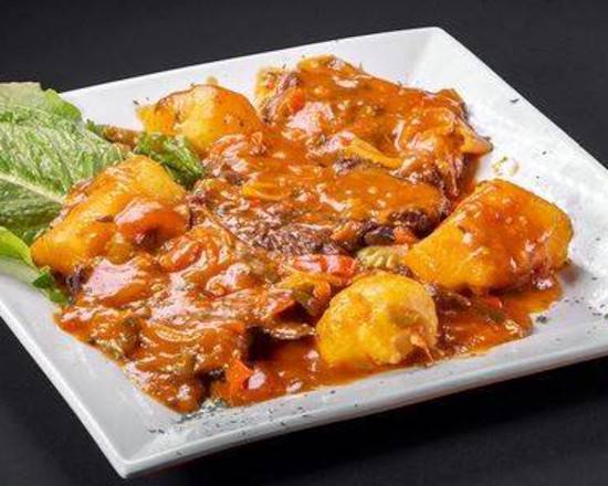 Order Bistec A La Criolla O Encebollado food online from El Mayoral De Sunset store, Miami on bringmethat.com