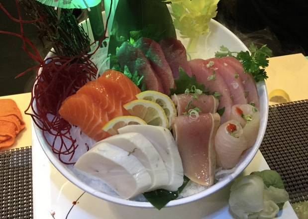 Order Sashimi Deluxe (16 pcs) food online from Sushi Bear Sushi & Grill store, Jacksonville on bringmethat.com