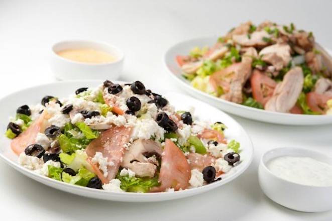Order Greek Salad food online from Vieux Carre Pizza store, New Orleans on bringmethat.com