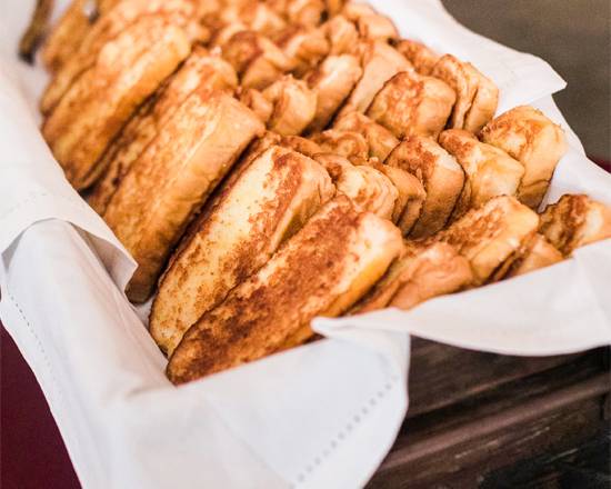 Order Toasted Loaf of BBQ Bread food online from Bar-b-Cutie store, Nashville on bringmethat.com