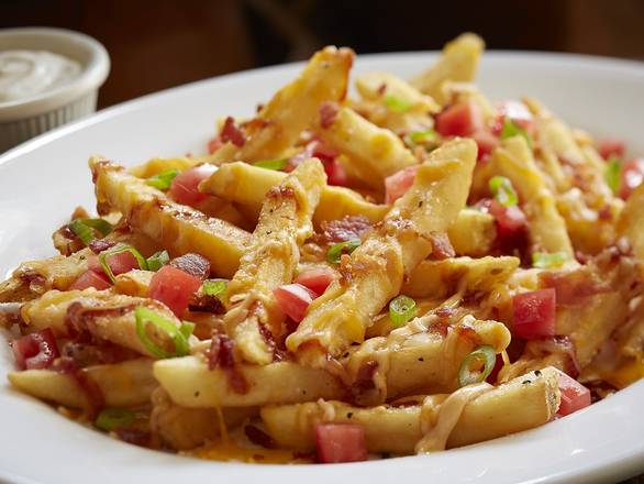 Order Loaded Cheese Fries food online from Smokey Bones store, Chattanooga on bringmethat.com