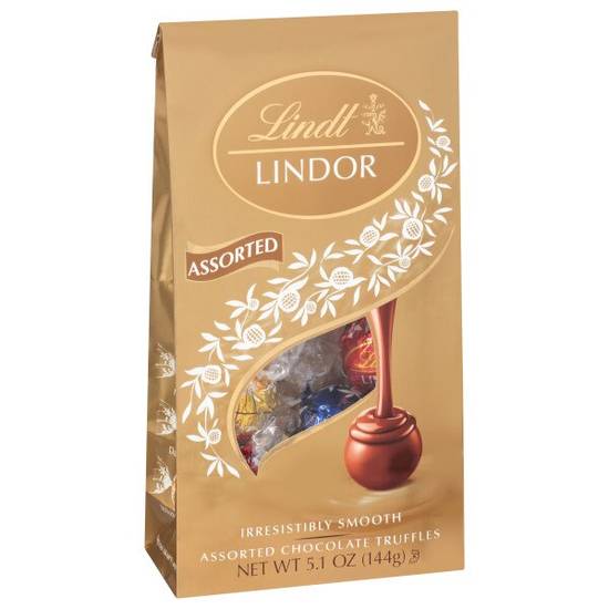 Order Lindt LINDOR Assorted Chocolate Truffles, Chocolate with Smooth, Melting Truffle Center, 5.1 oz. Bag food online from Cvs store, LINCOLN on bringmethat.com