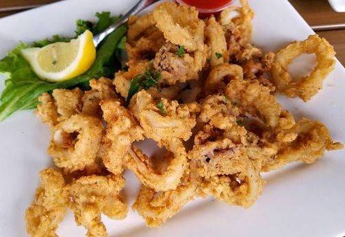 Order Fried Calamari food online from Juicy Mayport store, Jacksonville on bringmethat.com