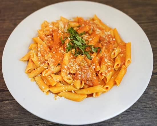 Order Penne w/ Vodka sauce food online from Tommy Taste Of Italy store, Woodland Park on bringmethat.com