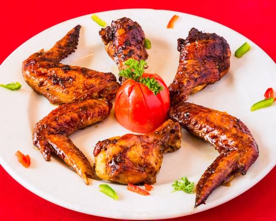 Order Jerk Wings food online from Jerk Pit Tampa store, Tampa on bringmethat.com