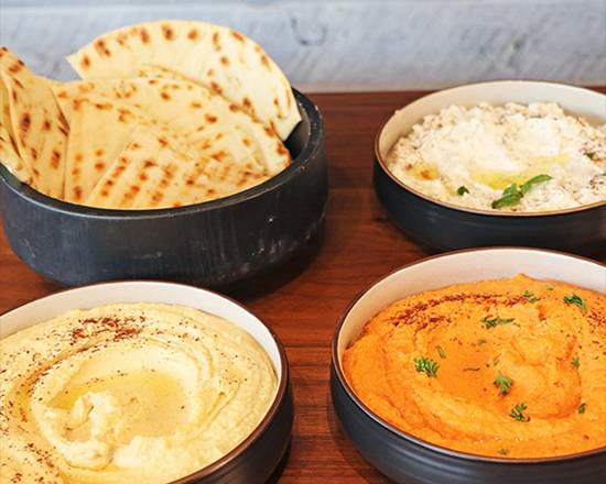 Order Hummus & Pita food online from Zuuk Mediterranean Kitchen store, Miami on bringmethat.com