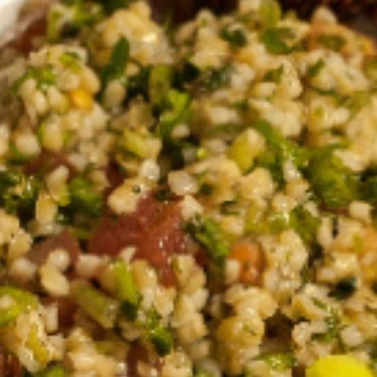 Order Tabouli Salad food online from Nagila Pizza store, Los Angeles on bringmethat.com