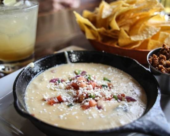 Order Pepper Queso Dip food online from Red Star Taco Bar store, Tacoma on bringmethat.com