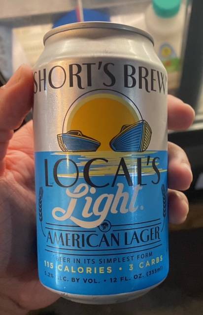 Order Short's Brew Local's Light Can (5.2% ABV) food online from Pom Pom's Teahouse and Sandwicheria store, Orlando on bringmethat.com