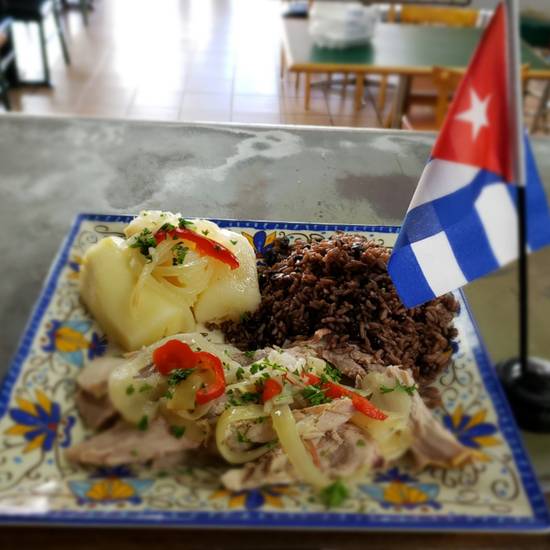 Order Lechon Asado food online from I Am Latin Cafe store, Miami on bringmethat.com