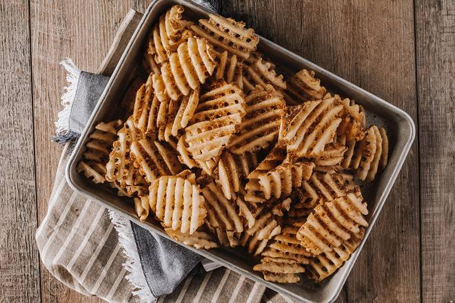 Order Pan of Waffle Fries  food online from Roadies Sliders store, Huntsville on bringmethat.com