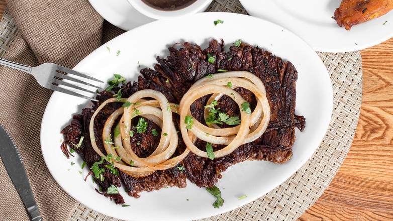Order #21 Vaca Frita (Sauteed Shredded Flank Steak) food online from Versailles store, Encino on bringmethat.com
