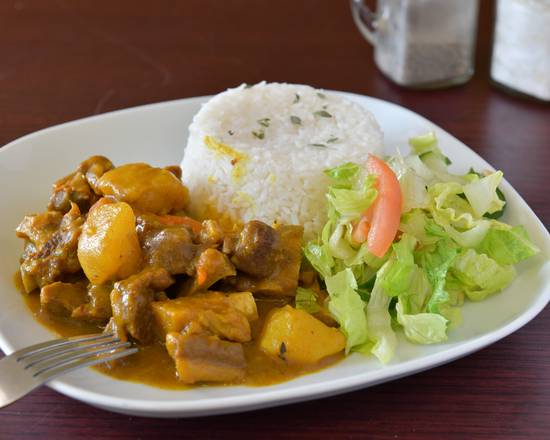 Order Curry Goat food online from Cravin Jamaican Cuisine store, Ossining on bringmethat.com