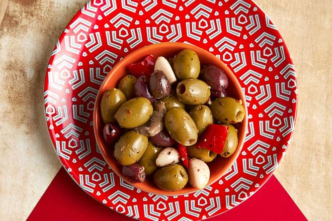 Order Spicy Mixed Olives food online from Nando's Peri-Peri store, College Park on bringmethat.com