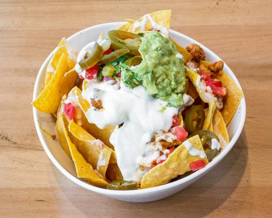 Order Kid's Chicken Nacho food online from In N Out Taco store, Clearwater on bringmethat.com