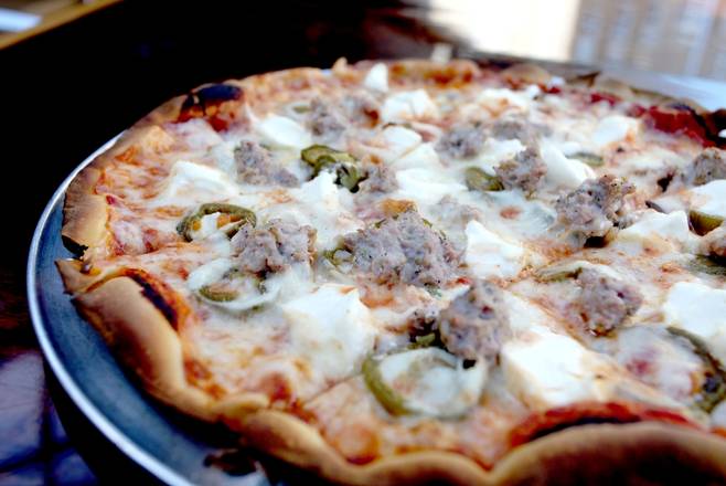 Order Topher food online from Pizza Man store, Milwaukee on bringmethat.com